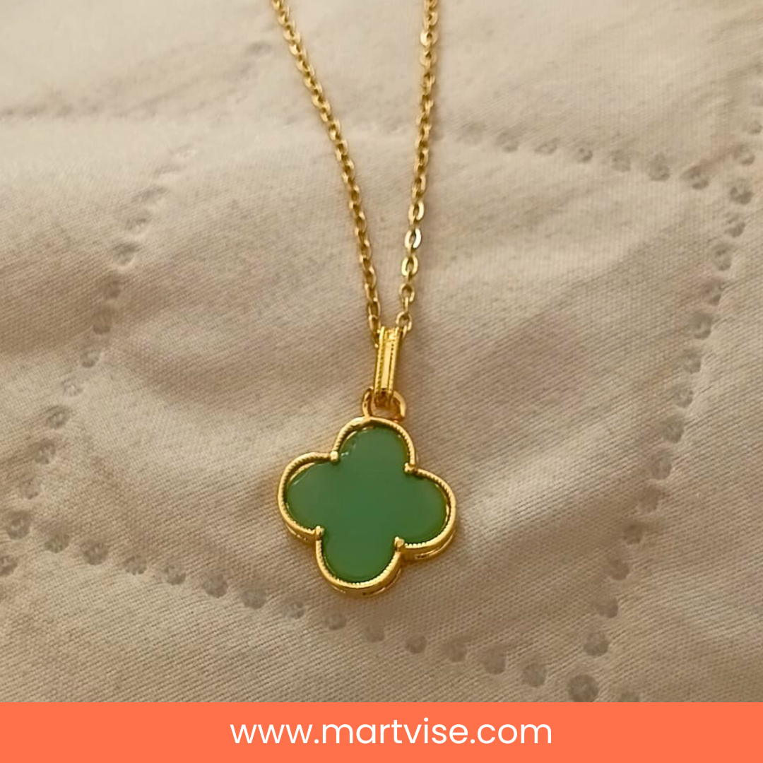 stainless-steel-clover-necklace-main.jpg – Elegant gold-tone stainless steel clover necklace with green enamel pendant.