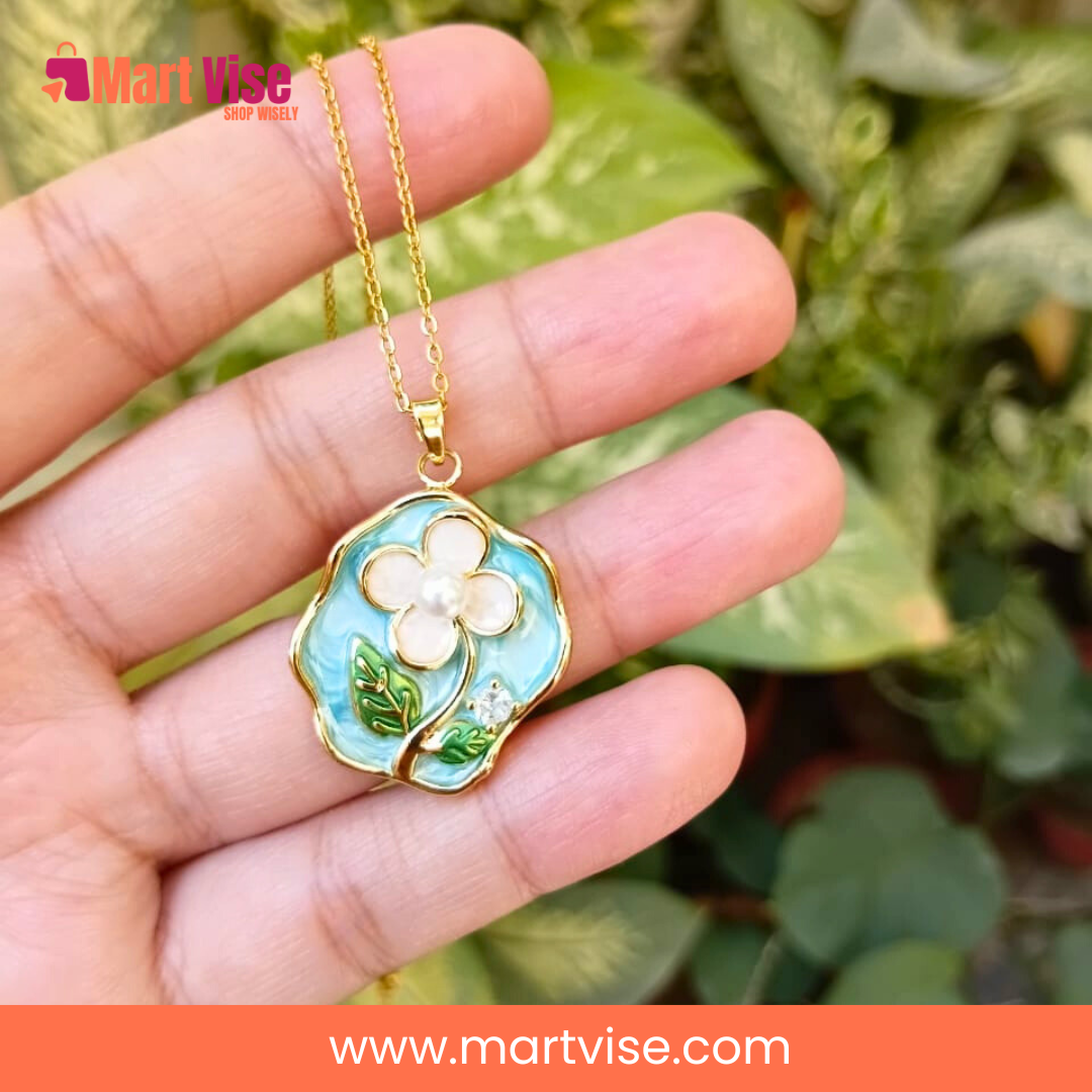 stainless-steel-statement-necklace-main.jpg – Gold-tone stainless steel statement necklace with floral enamel pendant.