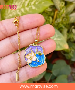 stainless-steel-enamel-necklace-main.jpg – Gold-tone stainless steel necklace with purple and blue enamel flower pendant.